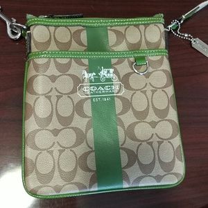 Coach small cross body purse.